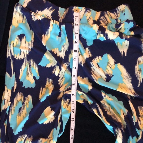 2 piece IMAN suit. Open jacket and pull on pants. Bright Navy, yellow, cheetah - Picture 16 of 16